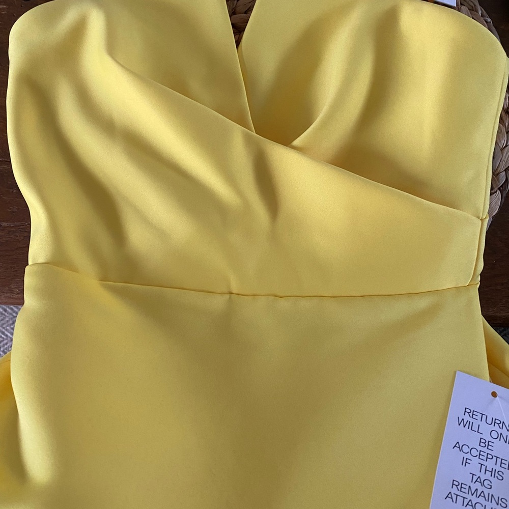 Prom Dress Never Worn. size 4. Canary yellow